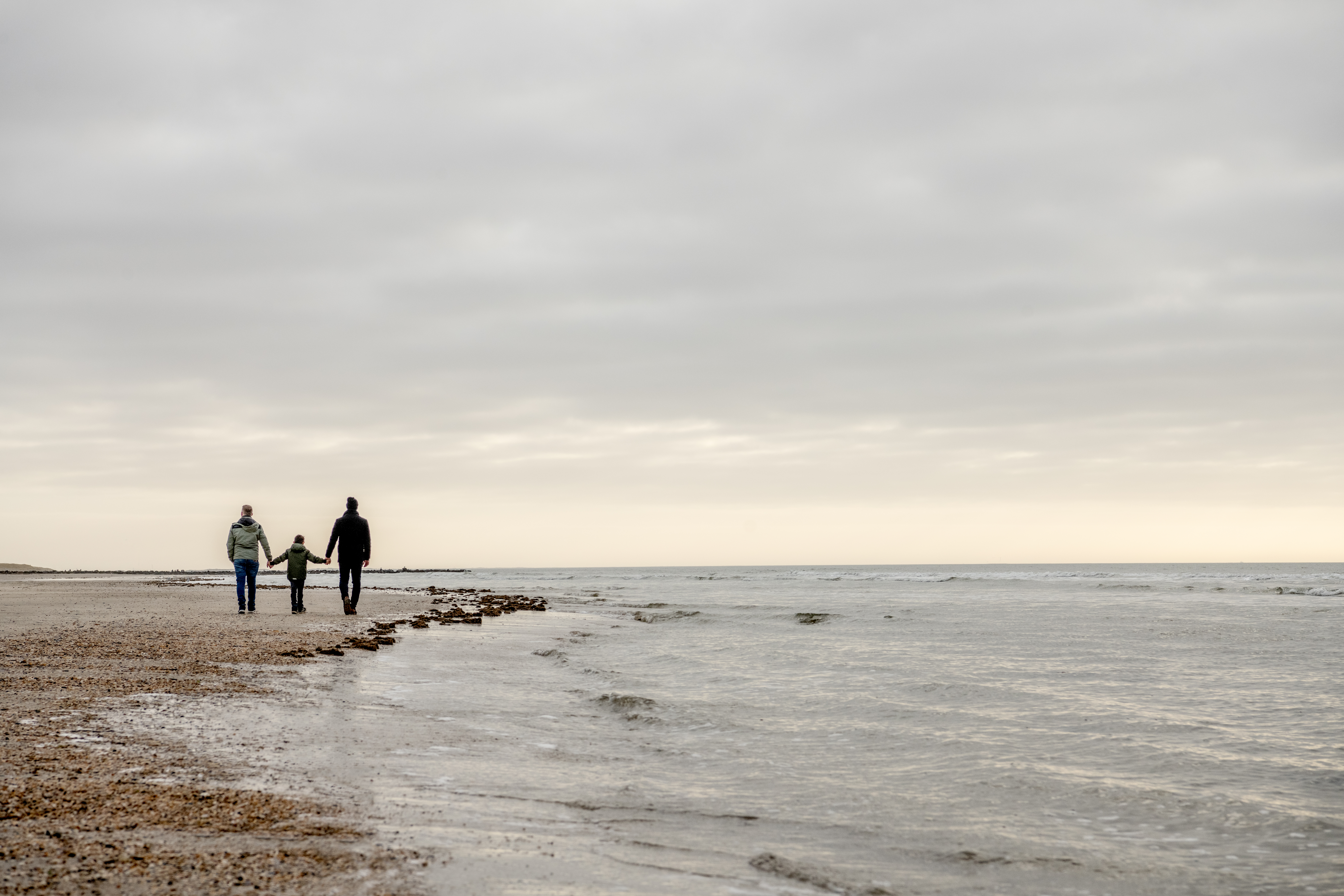 Een familie op het strand bij Ho © Mette Johnsen
