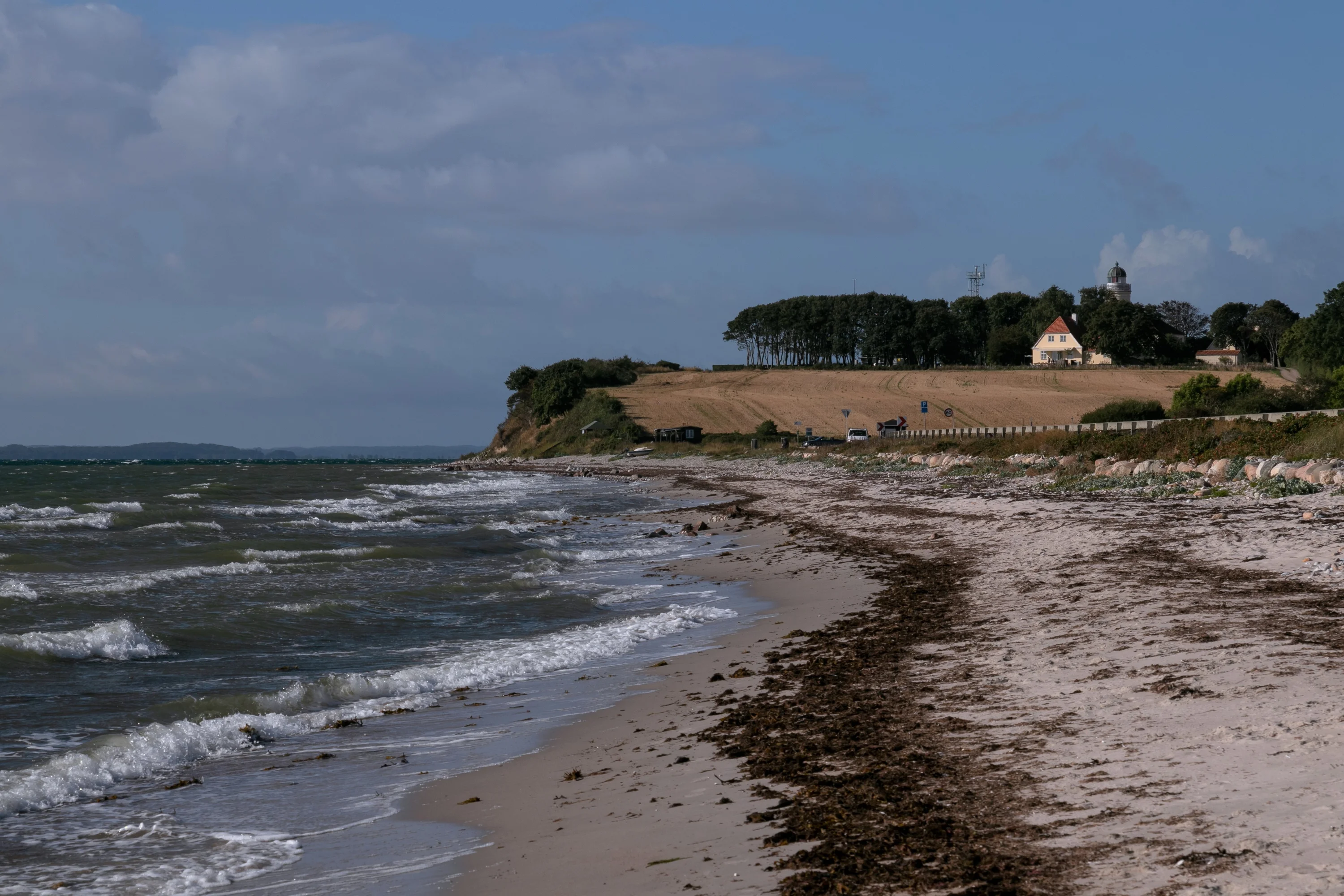 Drejet Strand met de vuurtoren van Kegnæs