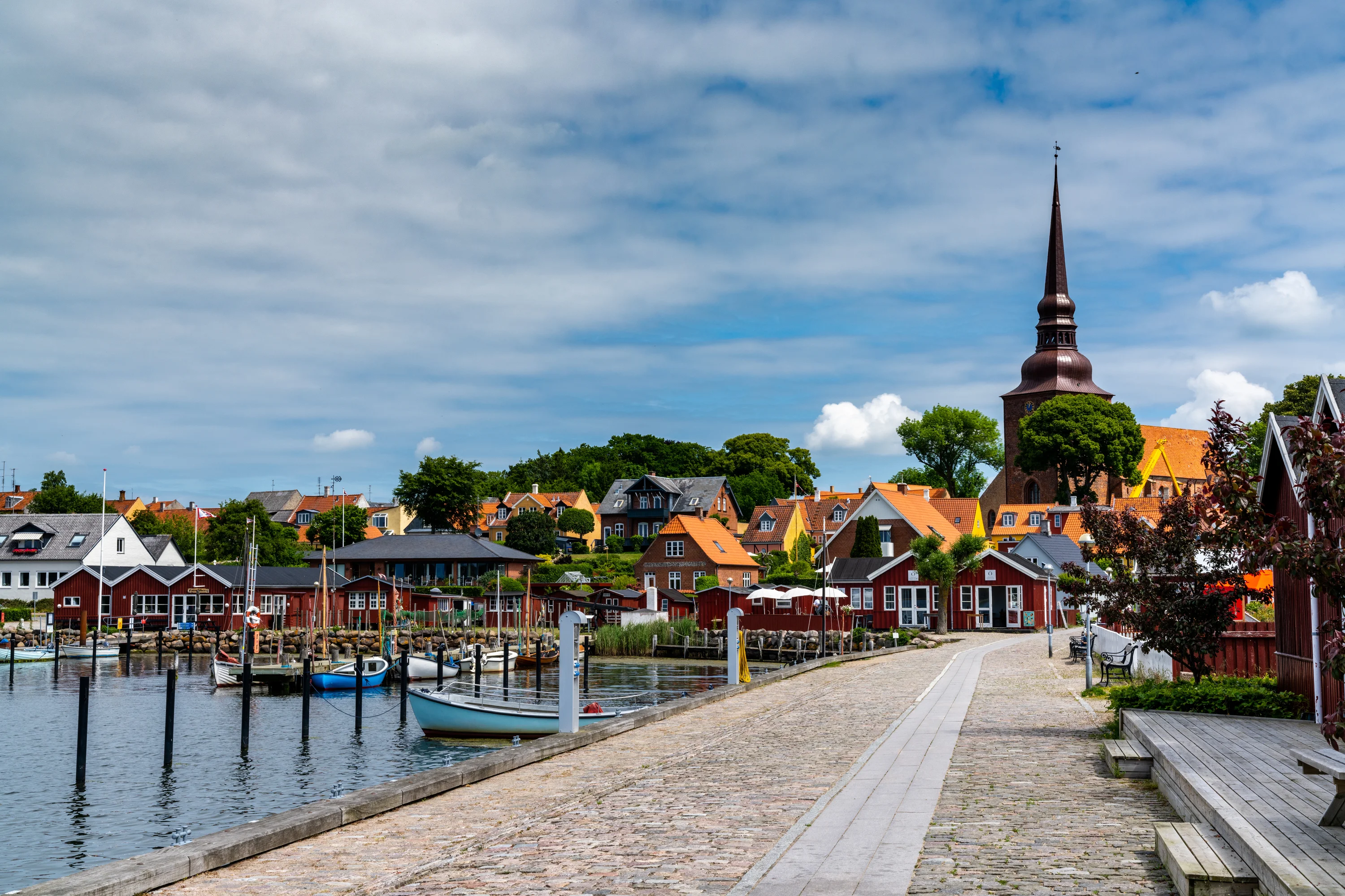 harbor front promenade and picturesque town center and marina in Nysted