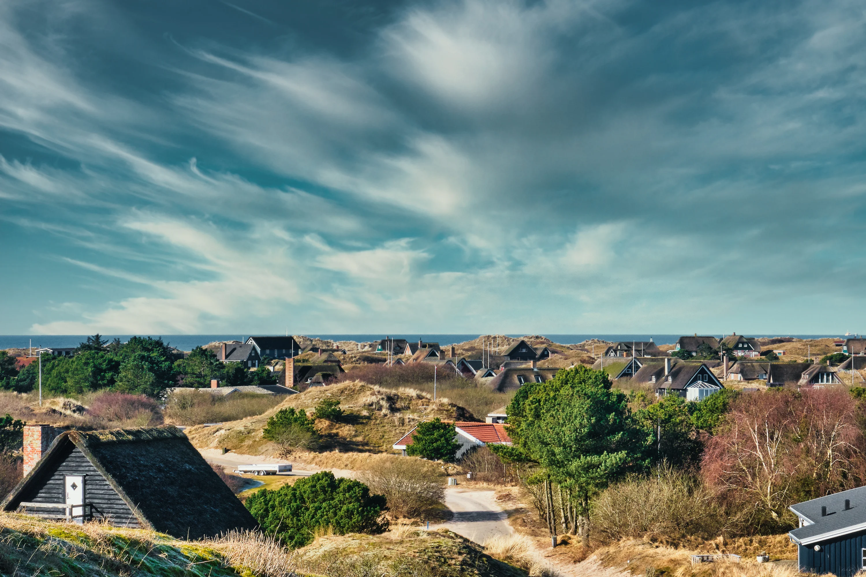 Zomerhuisjes in de duinen bij Rindby