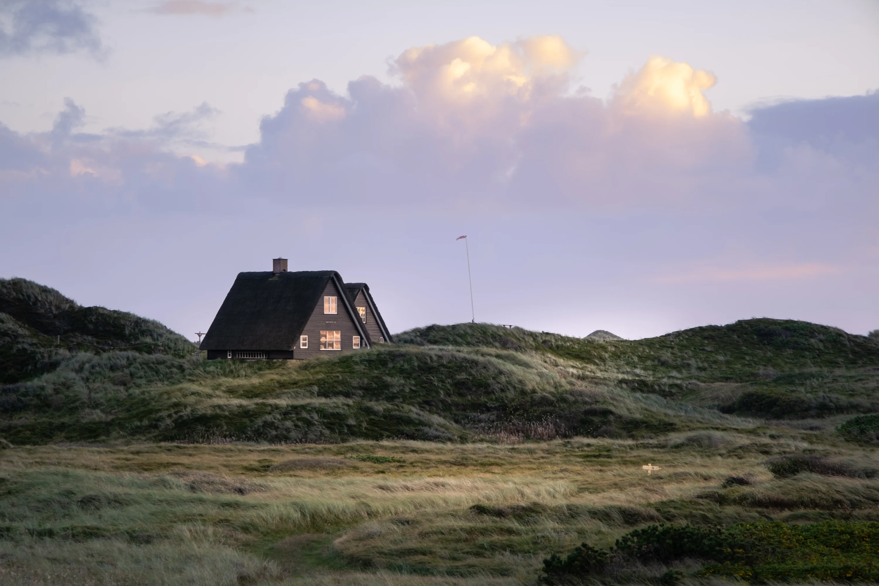 Huisjes in de duinen bij Henne